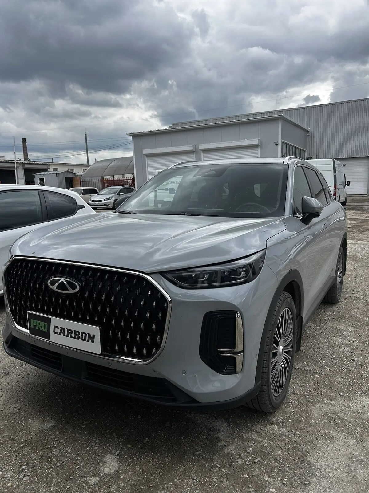 Chery Tiggo 9 до — серый глянец, вид спереди